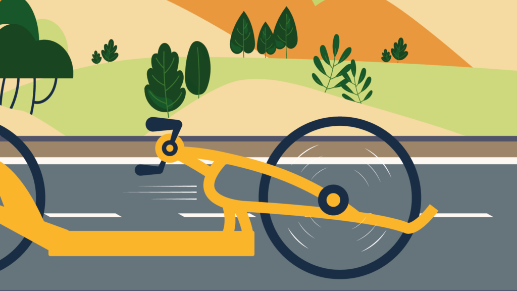 Handisport : Aperçu de notre kakémono handbike : handbike jaune sur une route en train d'avancer